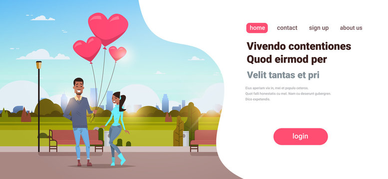 man giving woman pink heart shape air balloons happy valentines day concept african american couple in love city urban park cityscape background horizontal copy space