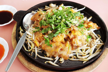 Fried oysters egg and bean sprouts