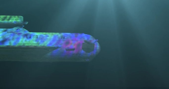Submarine Launching Torpedos. Model Submarine Under Water. Macro. 4K.

