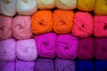 Handrcrafted colorful rainbow wool beginned to knitting above