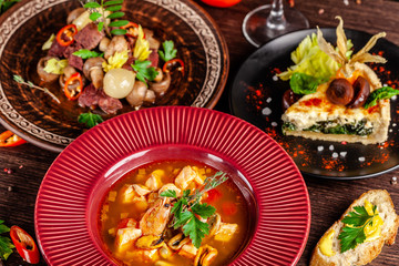 Concept of French cuisine. Laid table in a restaurant for a celebration of different dishes. background image. copy space