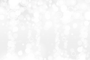 Silver and white bokeh lights defocused. Abstract background. Elegant, shiny, blurred light background. Magic christmas background. EPS 10.