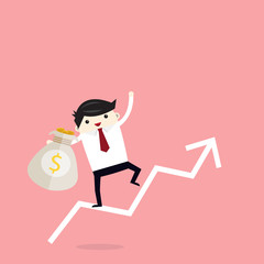 Obraz premium business man hold money bag,financial graph invesment concept,