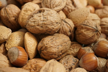 Shelled almonds, close up view of heap of almonds as background and texture.