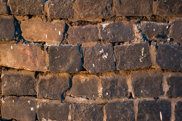 Old broken brick wall