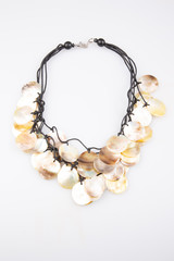 brown white home made shellfish necklace