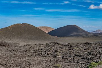 Amazing  landscape of Timanfaya National Park on the volcanic island of Lanzarote (Canary Islands) in Spain.