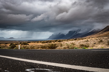 Huge and beautiful storm over Playa Famara beach and in Lanzarote, and La Graciosa Island....