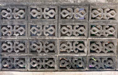 Ornamental patterns on stone background.