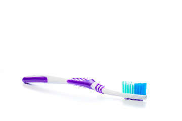 colored toothbrush on an isolated background, close up