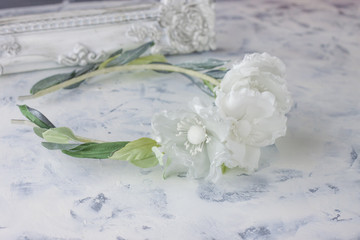 White wedding background with silk hair flowers