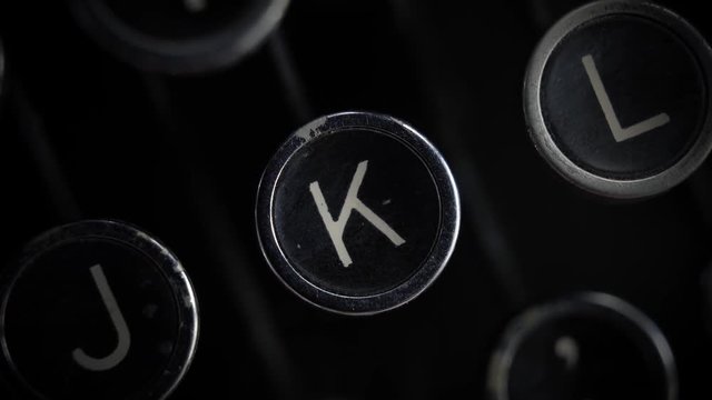 Macro close up of the K key on an old Remington Rand Model 1 Typewriter.
