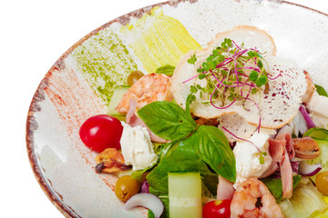 Fresh salad plate with shrimp, tomato and mixed greens