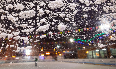 Snow on the glass at night as a background