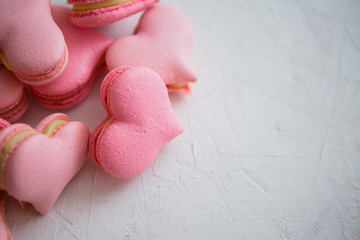 fresh delicate pink handmade cookies in the shape of a heart