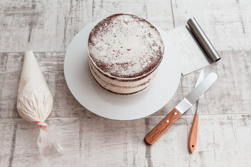 chocolate sponge cake on the pastry chef's table before decorating