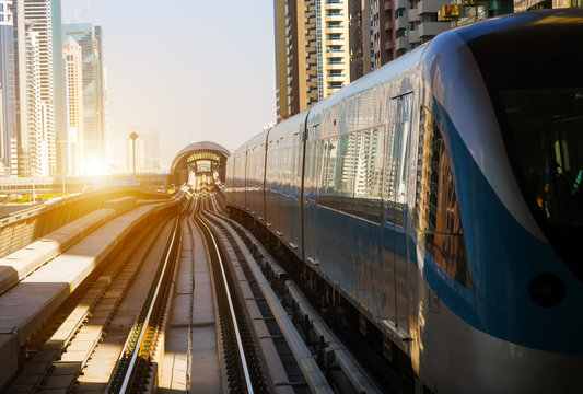 Dubai Metro train scenes sunset