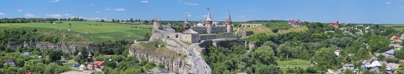Fototapeta na wymiar Panorama with Castle in Kamianets-Podilskyi, Ukraine. This is a former Ruthenian-Lithuanian castle and a later Polish fortress. It was first mentioned in the 14th century.