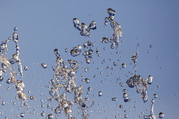 drops of the fountain in the sky
