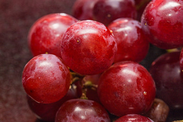 Close up of fresh and organic red grapes 