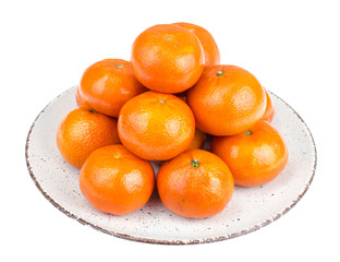 Sweet ripe tangerines on plate