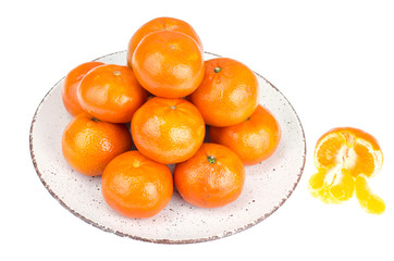 Sweet ripe tangerines on plate