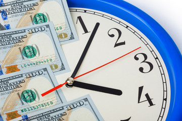 Clock and money - business concept