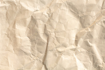 Light brown crumpled paper texture for background.