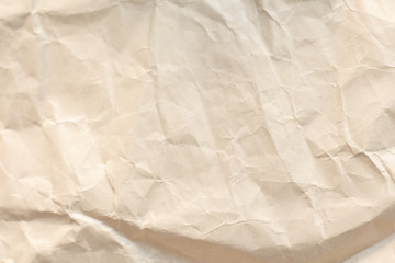 Light brown crumpled paper texture for background.backdrop for art work design or add text message.
