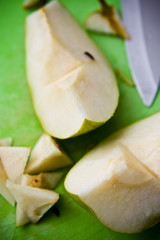 Healthy pear on cutting board