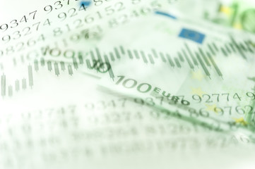 Double exposure Stock market display or forex trading graph and candlestick chart on Euro banknote.