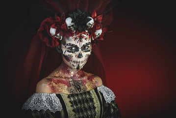 Young girl in the image of Santa Muerte