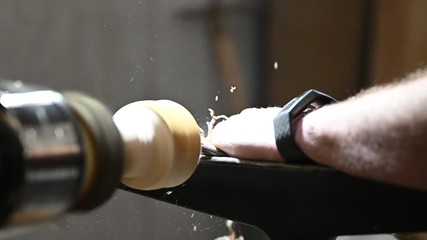 slowmotion of turnery machine with wood editing for bowl creation