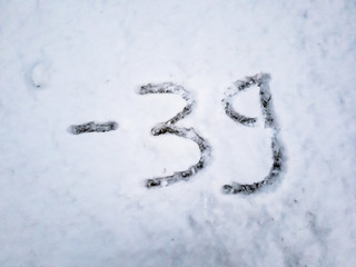 Temperature of -39 written in the freshly fallen snow
