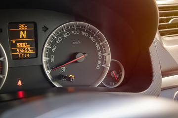 Speedometer Gauge on Dashboard in The Car