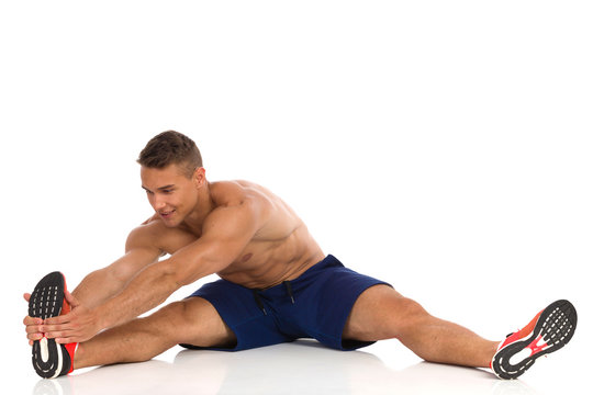 Man Showing Hamstring Stretching Exercise