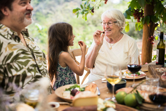 Happy grandmother and granddaughter bonding