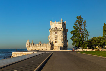 Fototapeta na wymiar Tower of Belem, or Tower of St Vincent, near Lisbon - popular sight and touristic place in Portugal, located in the civil parish of Santa Maria de Belem on the bank of river Tagus