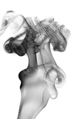 Peaceful African man combined using dramatic double exposure art techniques of smoke photographs