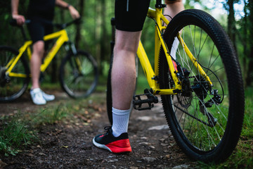 Close up of the wheels of a mountain bike