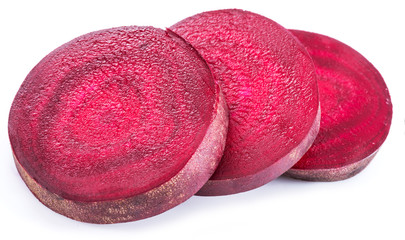 Red beet or beetroot slices on white background.