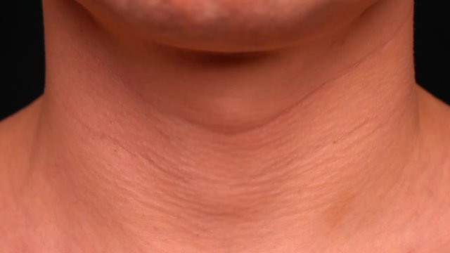 man gulp Adam's apple close up sequence