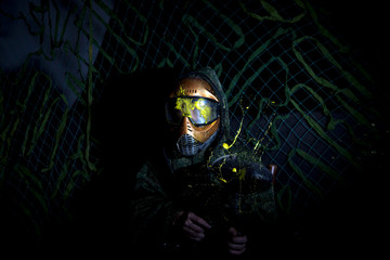 Paintball Mask zoomed in on.Splashes after direct hit to protecting mask in the paintball game.the...