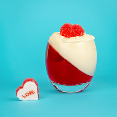 Panna Cotta in Valentines Day with hearts on blue background