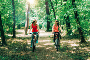 Women Riding Bikes Together