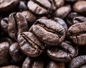 Roasted coffee beans. Food and drink background. Top view.