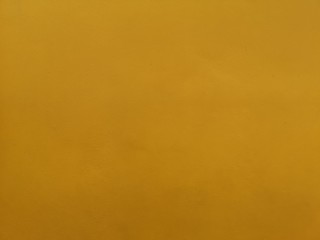 Texture wall Yellow custard color paint on cement surface