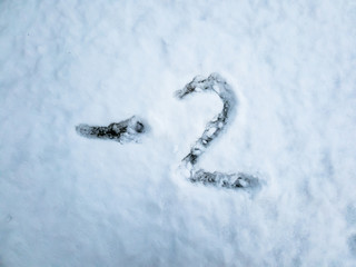 Temperature of -2 written in the freshly fallen snow