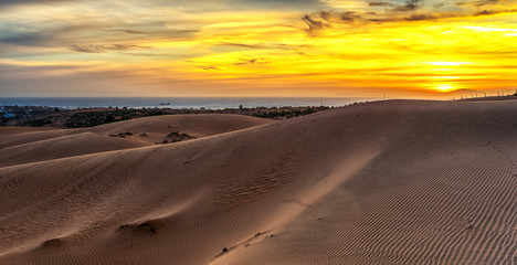 Fototapeta na wymiar Red sand dunes in Binh Thuan near the town of Mui Ne, Vietnam. Mui Ne is popular travel destination