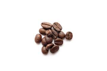 Roasted coffee beans isolated on white background. Close-up.